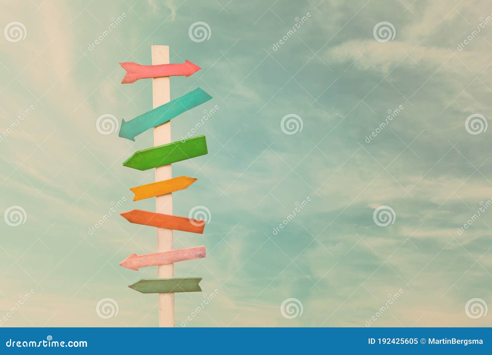 colorful wooden direction arrow signs