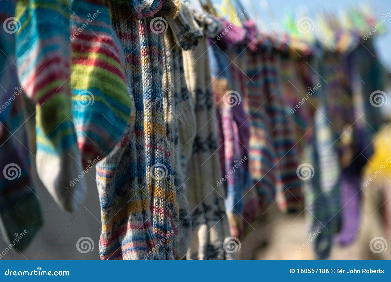 Colorful Woolen Socks Drying Stock Photo - Image of outside, outdoors ...