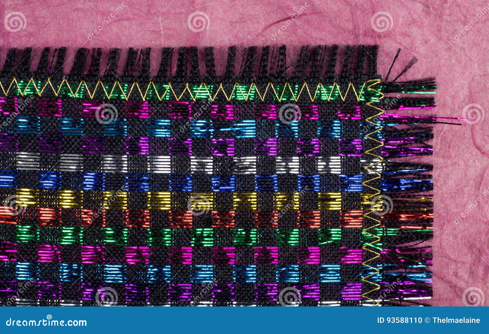 Colorful Woven Placemat with Shiny Metallic Thread Stock Photo Image