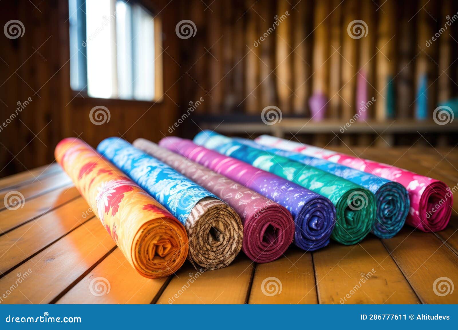 Colorful Wrapping Paper Rolls on a Wooden Table Stock Image Image of