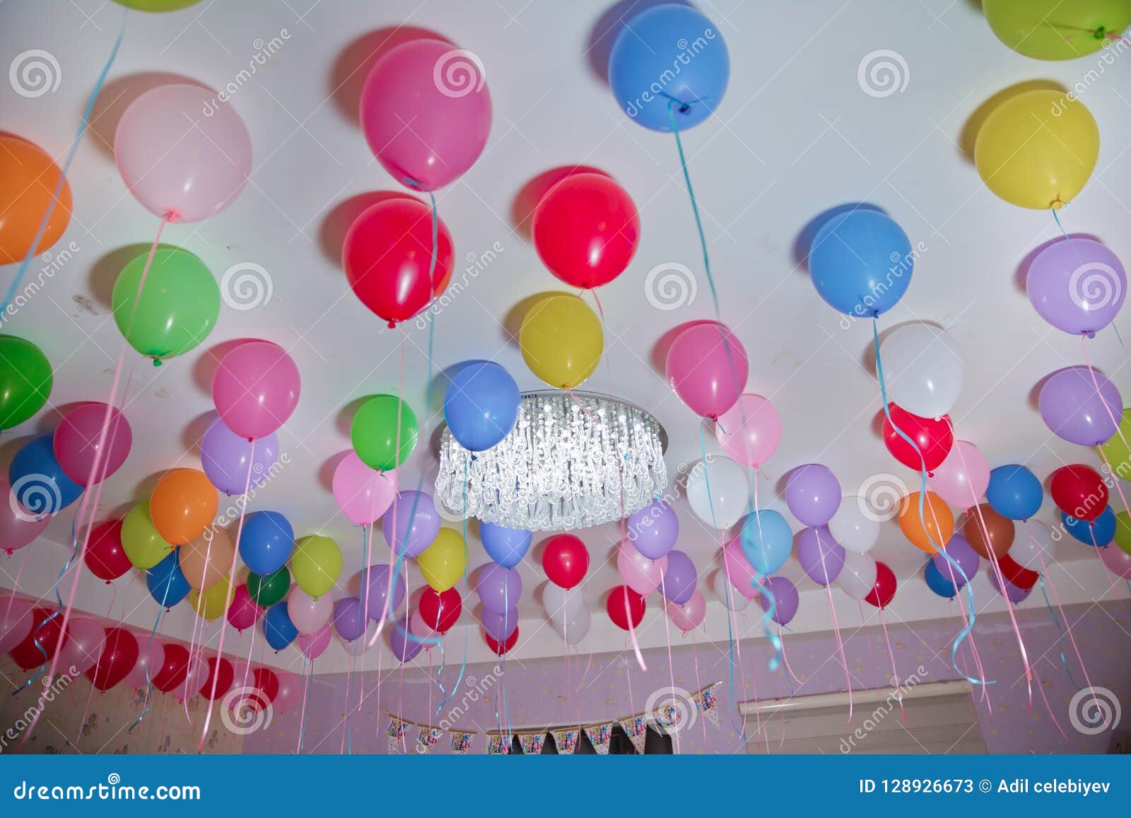 Colorfull Balloons Float On The White Ceiling In The Room For The