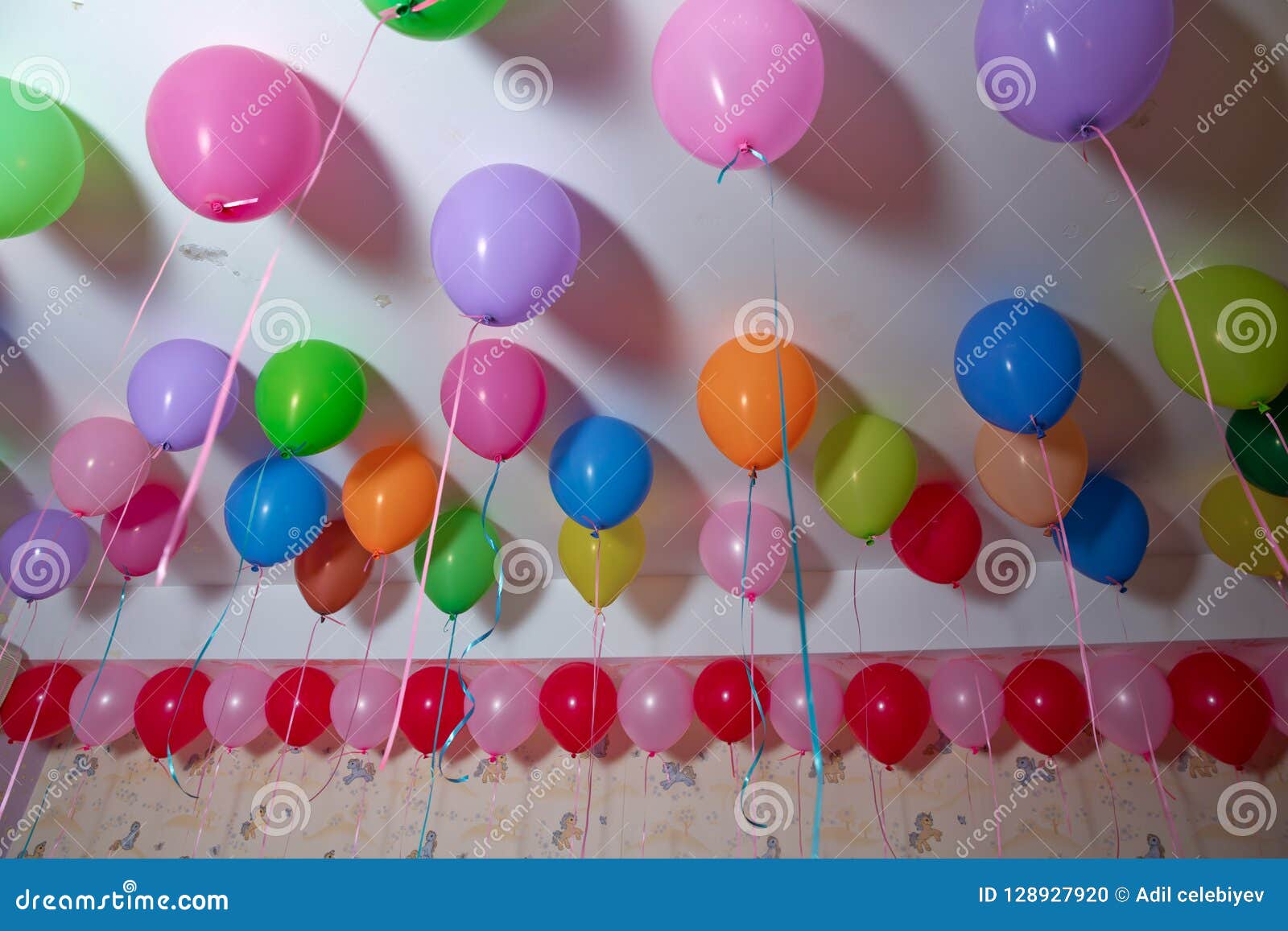 Colorfull Balloons Float On The White Ceiling In The Room For The