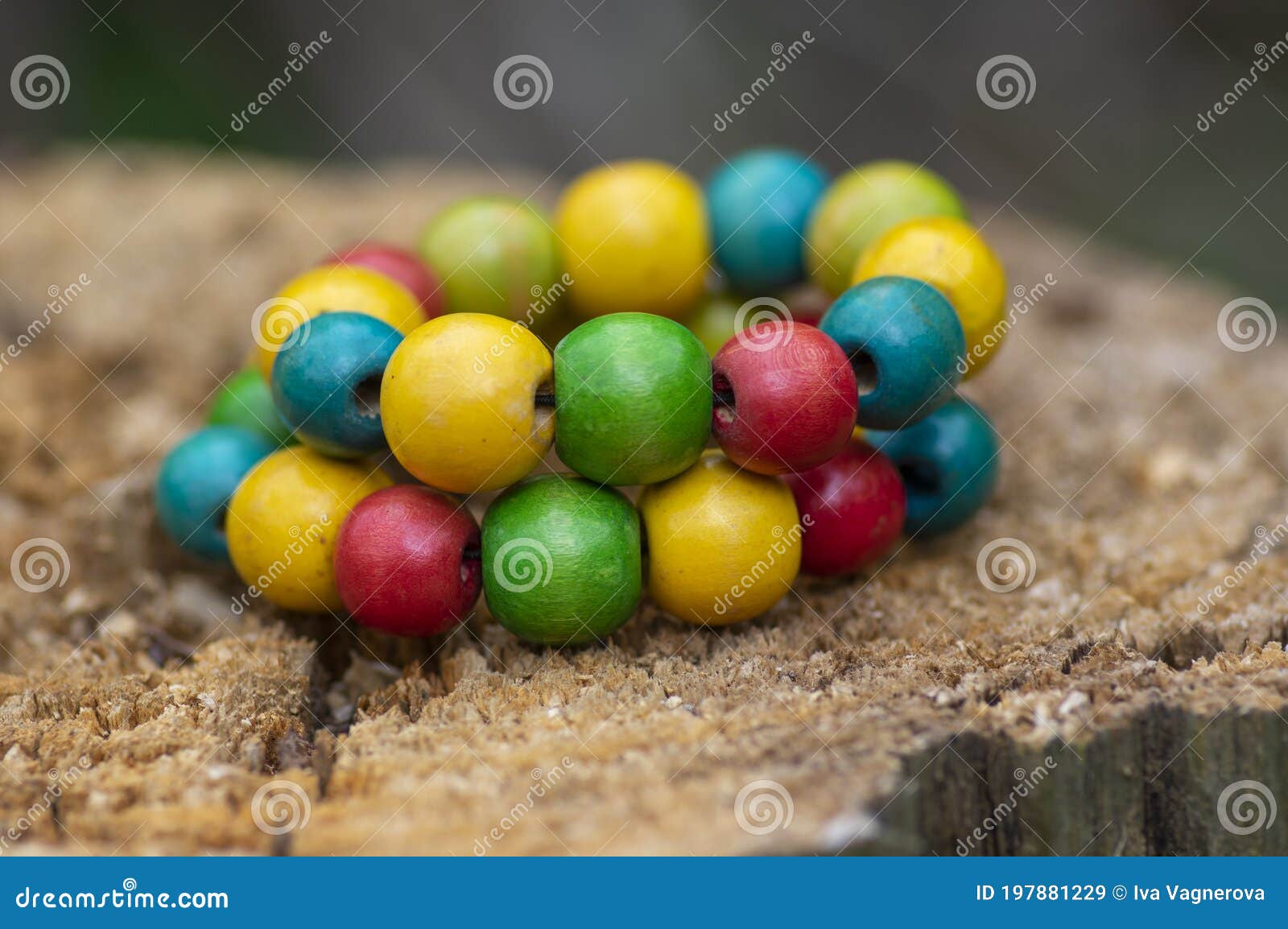 Colorfull Wooden Beads on Thread, Fashionable Beaded Bracelets, Bright  Beautiful Colors Green Red Yellow and Light Blue Stock Image - Image of  green, accessory: 197881229