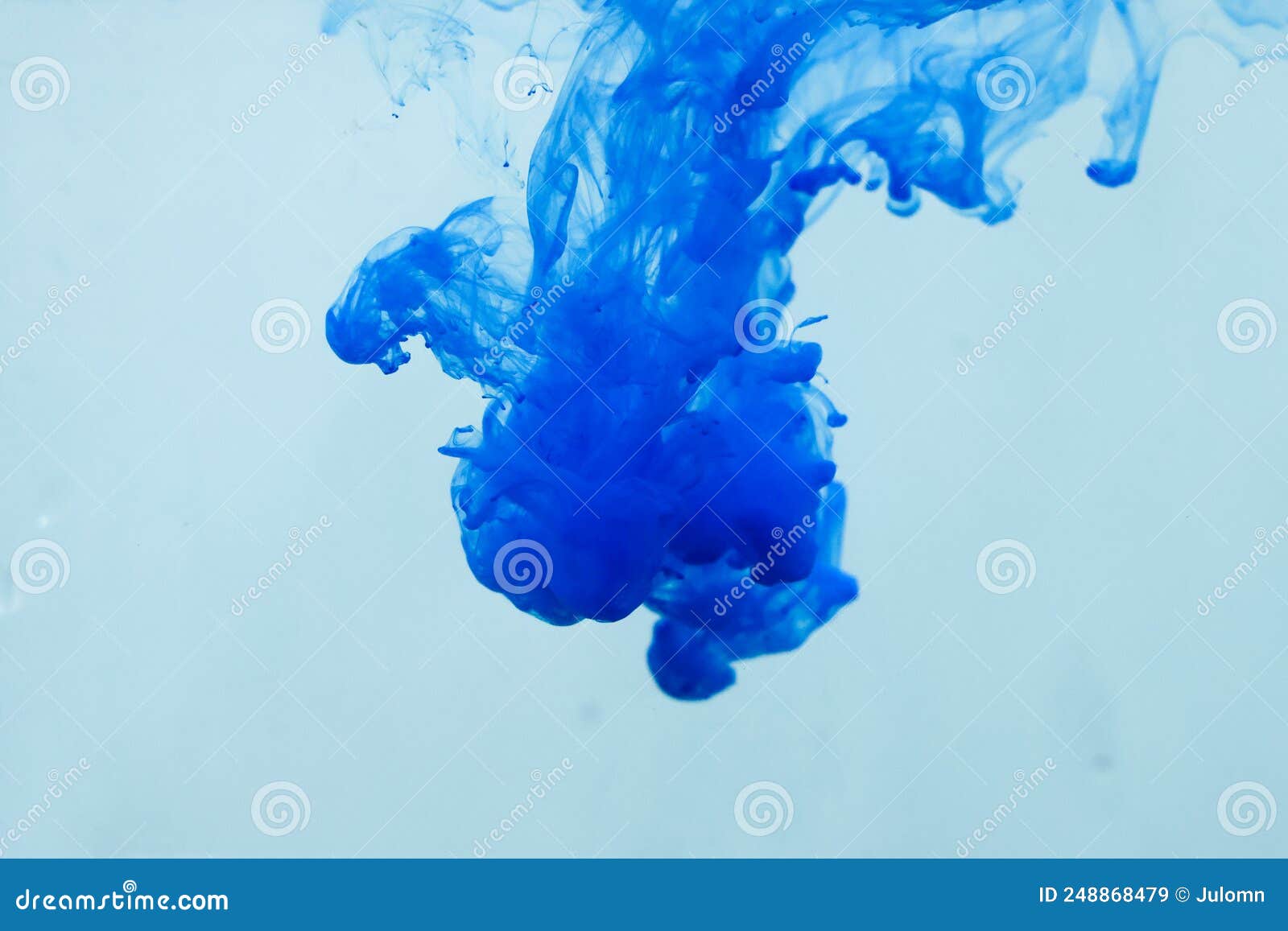 Colors Dropped into Liquid in Motion. Ink Swirling in Water Stock Image ...