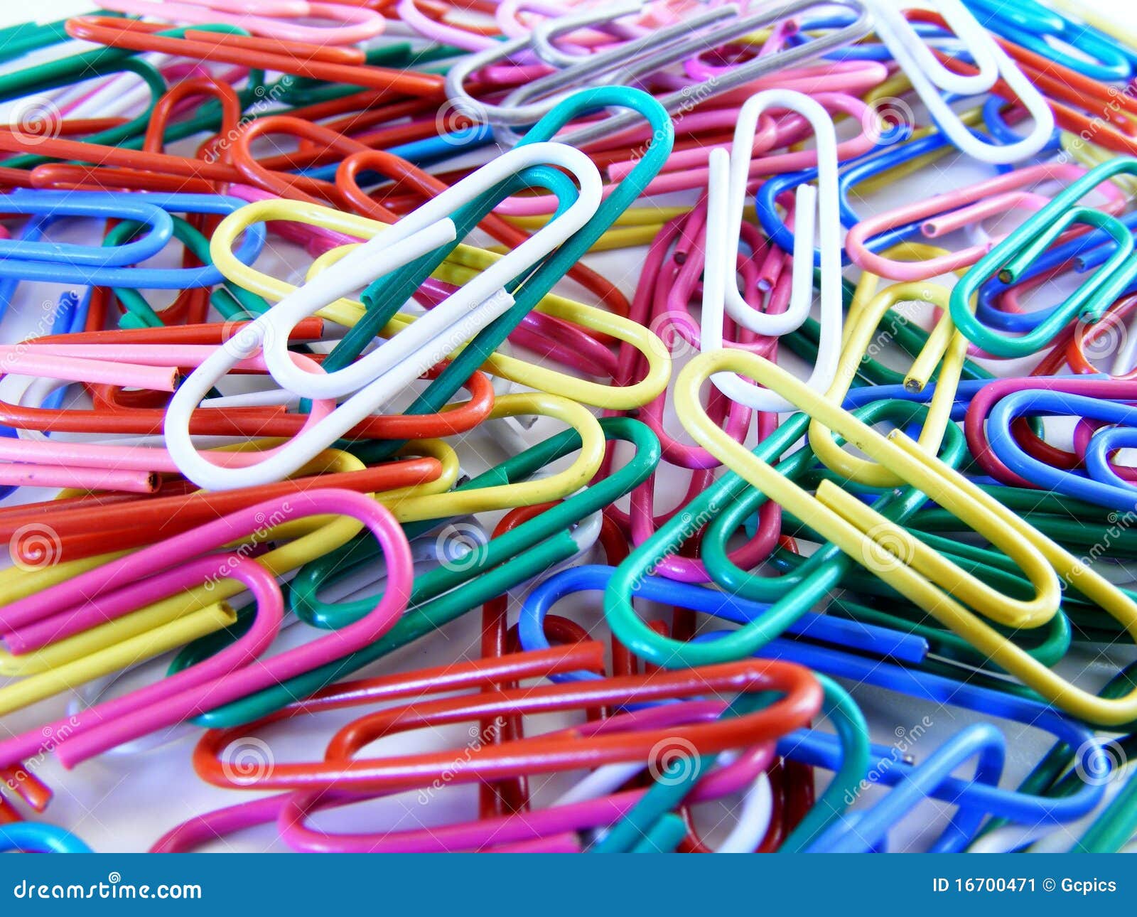 colour paper clips in a pile