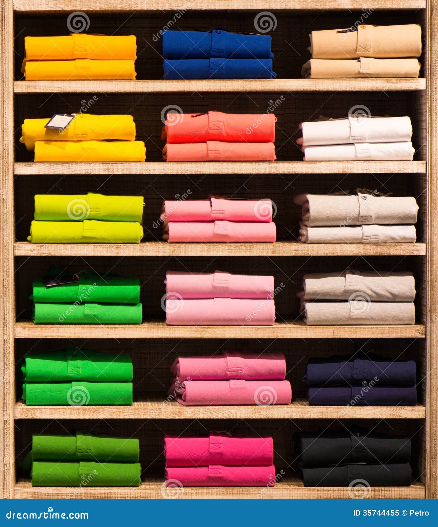 Colour Shirts at Shelf in Shop Stock Image - Image of clothing, center