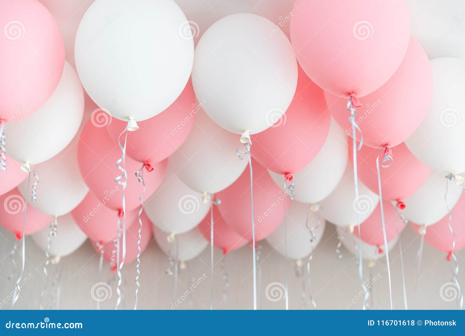 Colourful balloons, pink, white, streamers. Helium Ballon floating