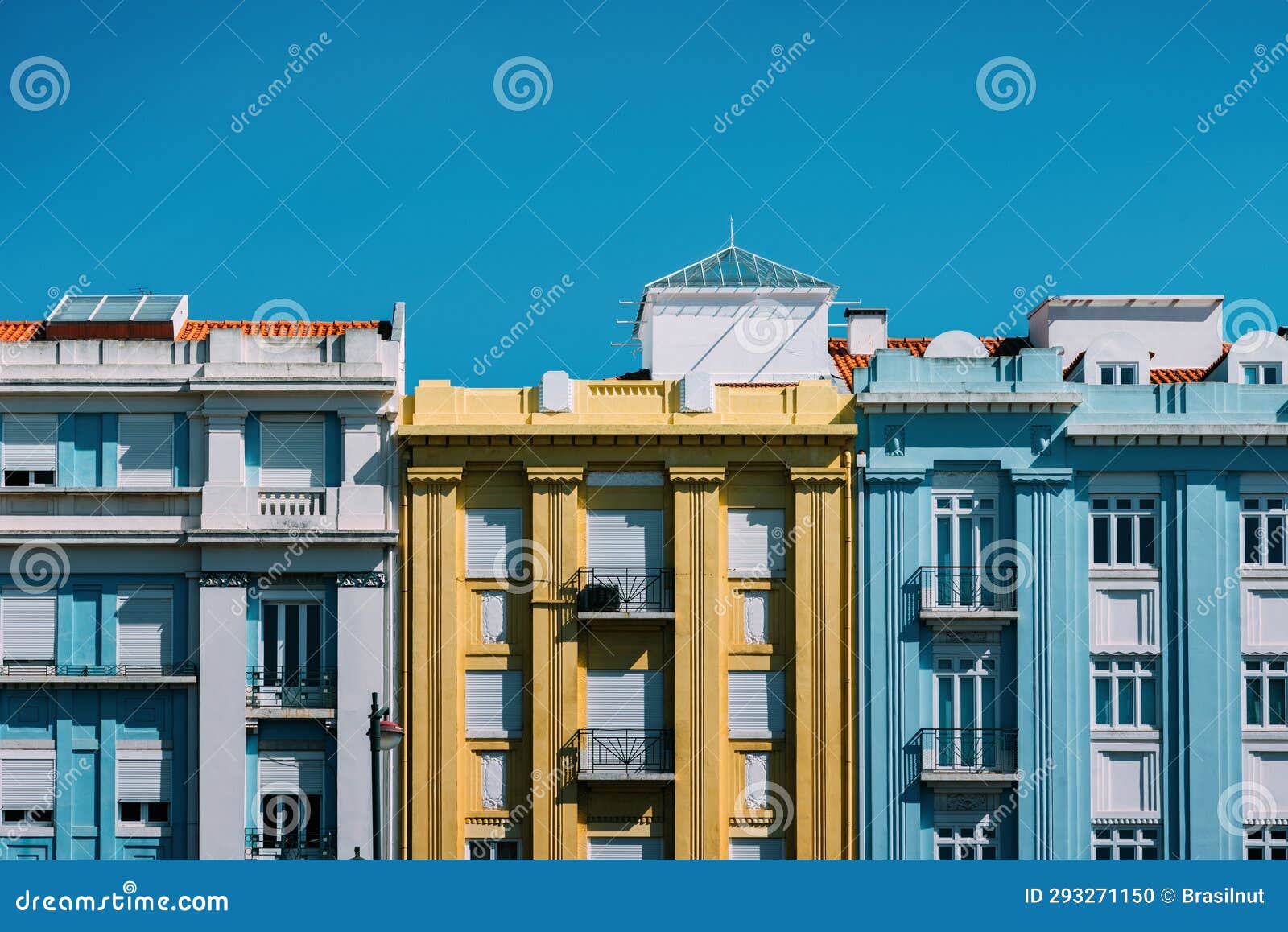 colourful building facades in campo pequeno, lisbon, portugal on a sunny day