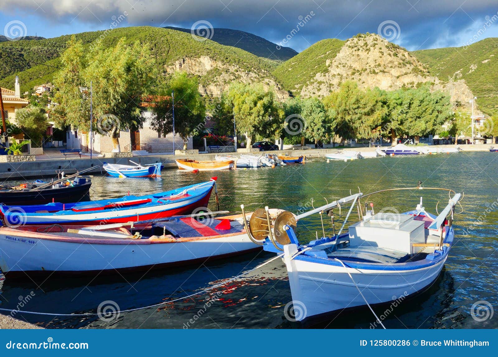 Colourful Greek Fishing Boats in Small Village Harbour, Greece ...