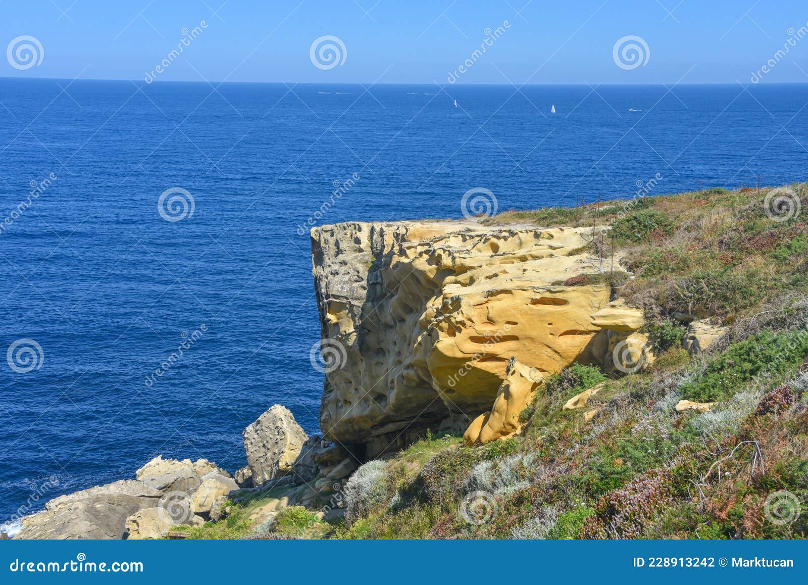 colourful rock formations on the cantabrian coastline. mount jaizkibel, basque country, spain