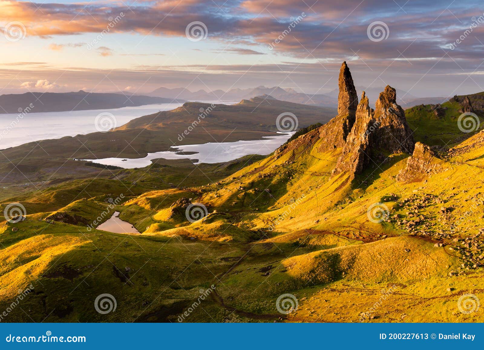 colourful sunrise at scotlands most iconic viewpoint; the old man of storr on the isle of skye.