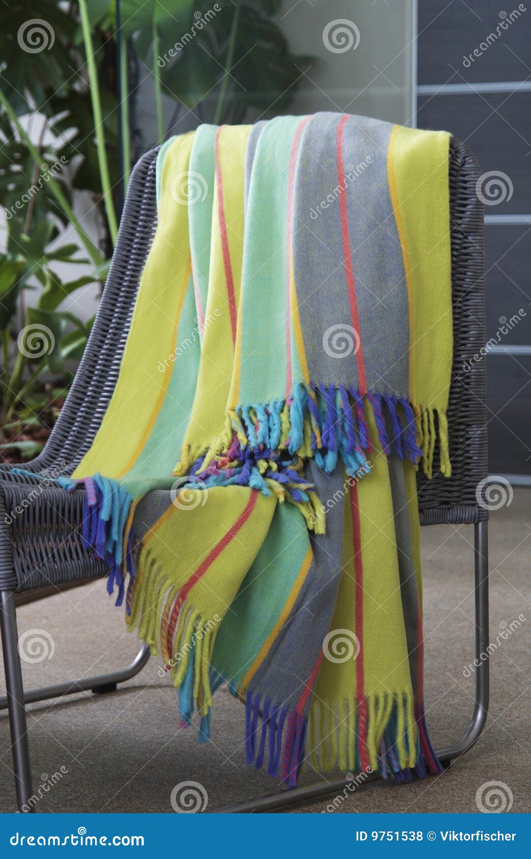 Colourful throw on a chair stock photo. Image of living 9751538