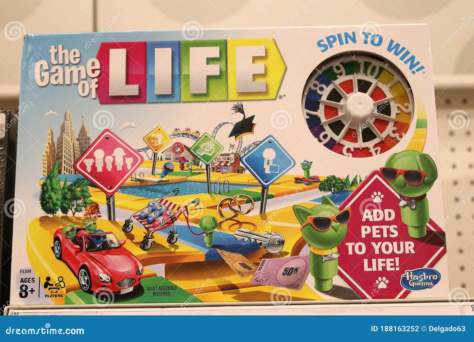 The Game of Life by Milton Bradley. The gameboard & all its