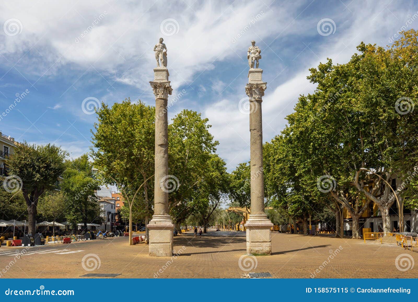 roman columns at alameda de hercules in seville, spain