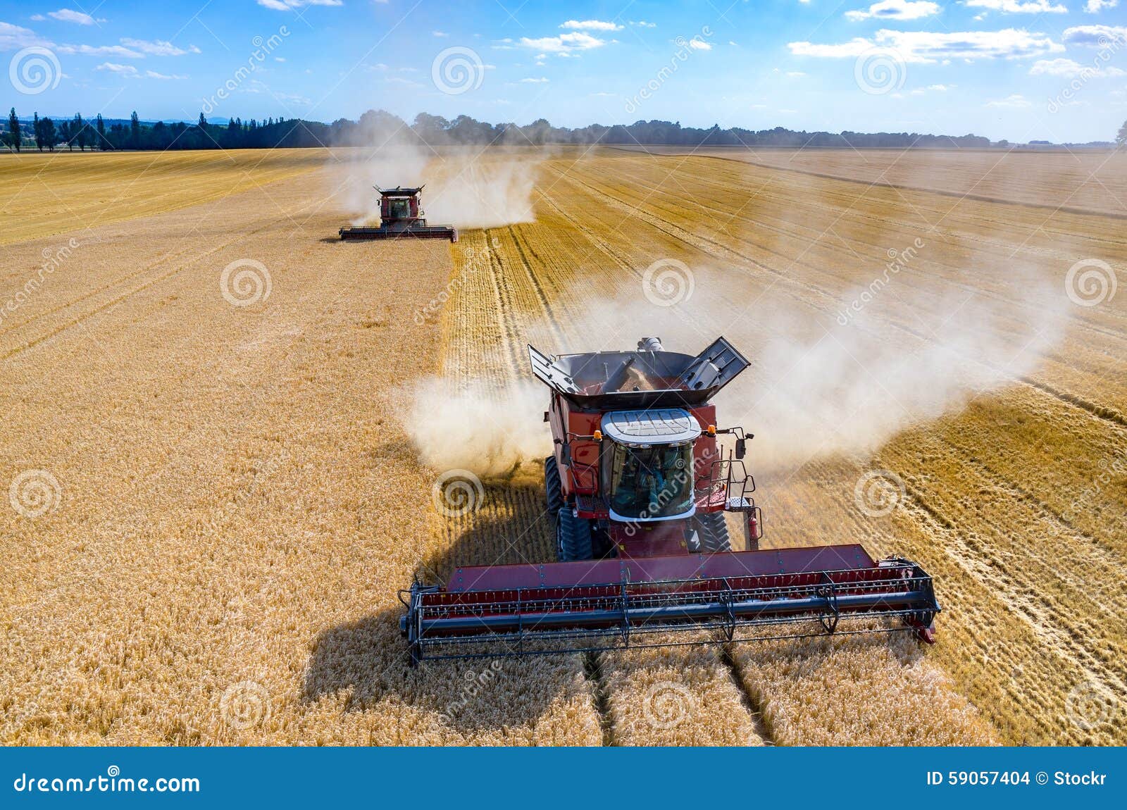 Combines and Tractors Working on the Wheat Field Stock Photo Image of