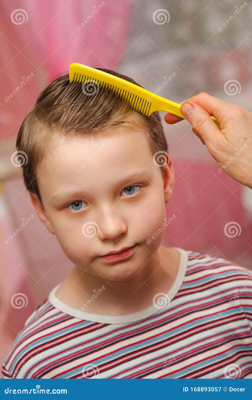 Combing a Child Hair with a Plastic Comb Stock Image Image of