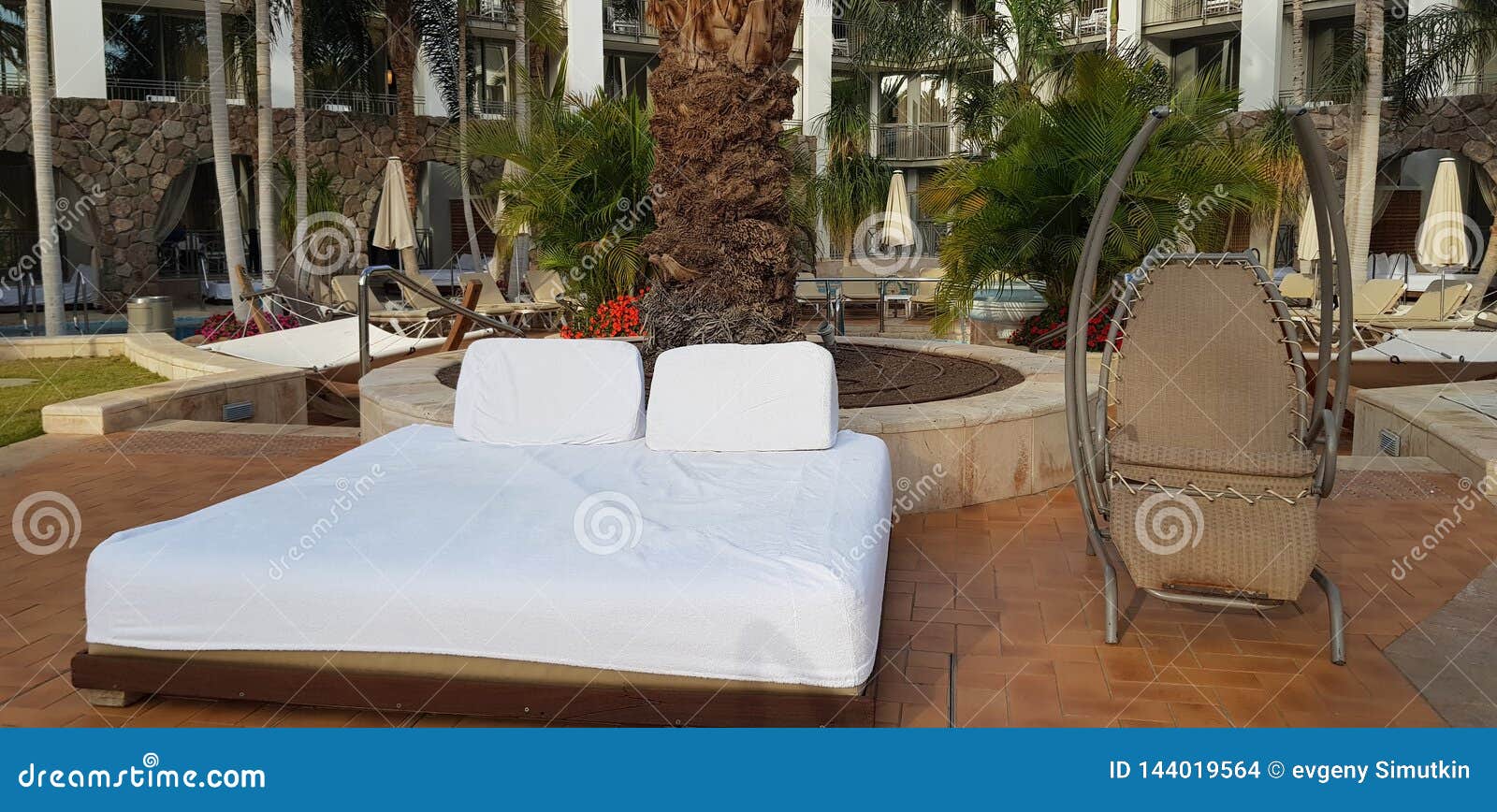 Bed For Tan And Rest With White Mattress Near A Rocking ...