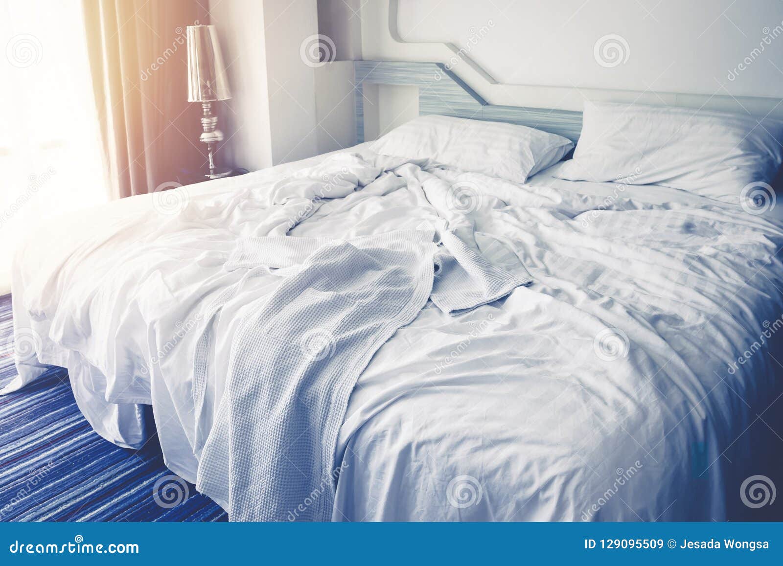 Comfortable Bedroom Messy Bedding Sheets And Duvet With Wrinkle