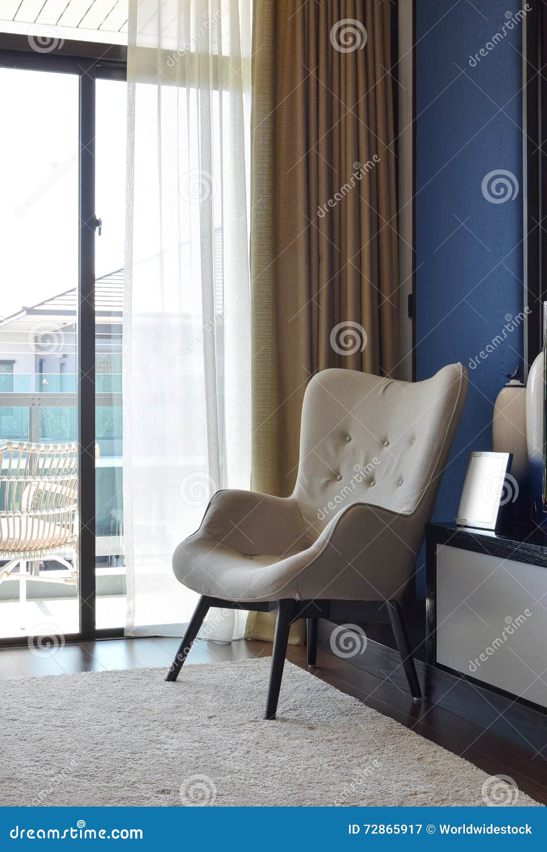 Comfortable Chair On Carpet In Modern Bedroom Stock Image