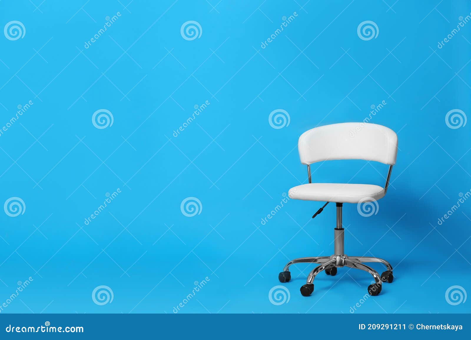 Comfortable Office Chair on Light Blue Background, Space for Text Stock