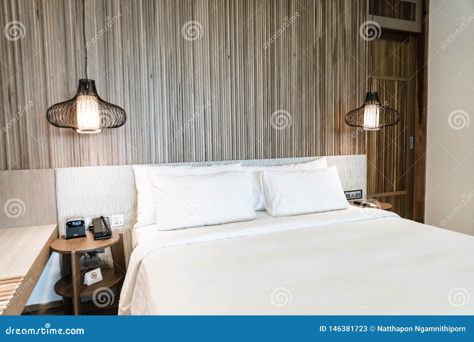 Comfortable Pillow on Bed Decoration in Hotel Bedroom Stock Image