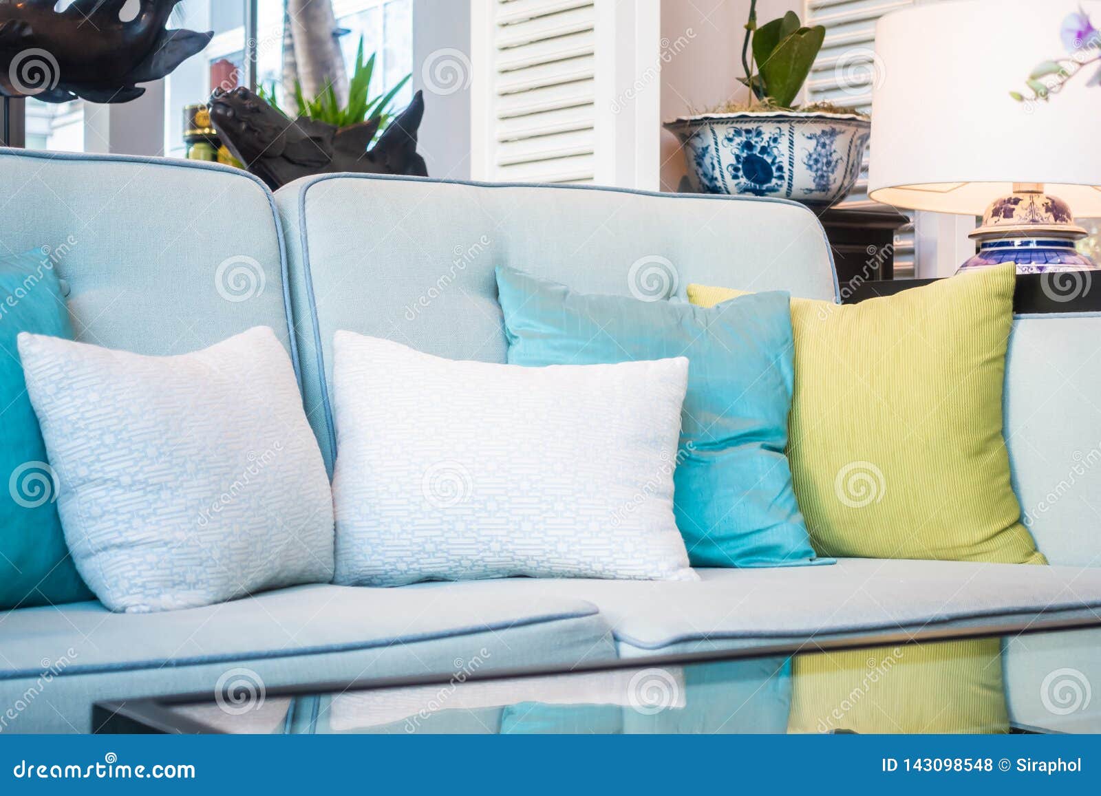 Comfortable Pillow on Sofa Chair Decoration Interior Stock Photo