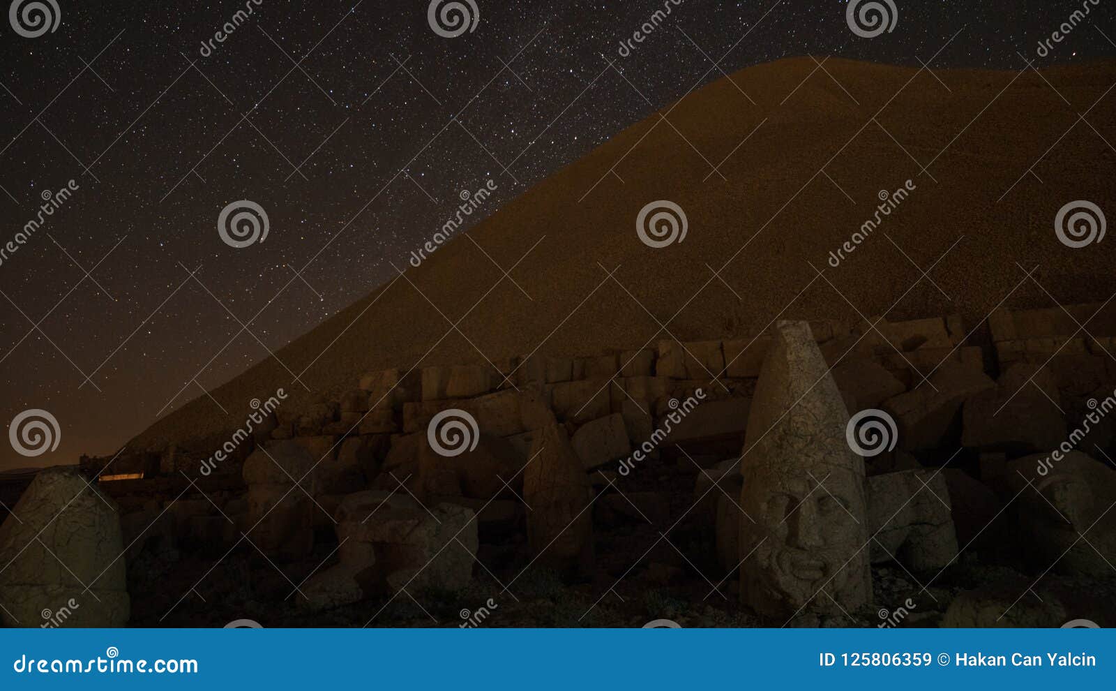 commagene statues on the summit of mount nemrut at night with stars in the sky, adiyaman, turkey