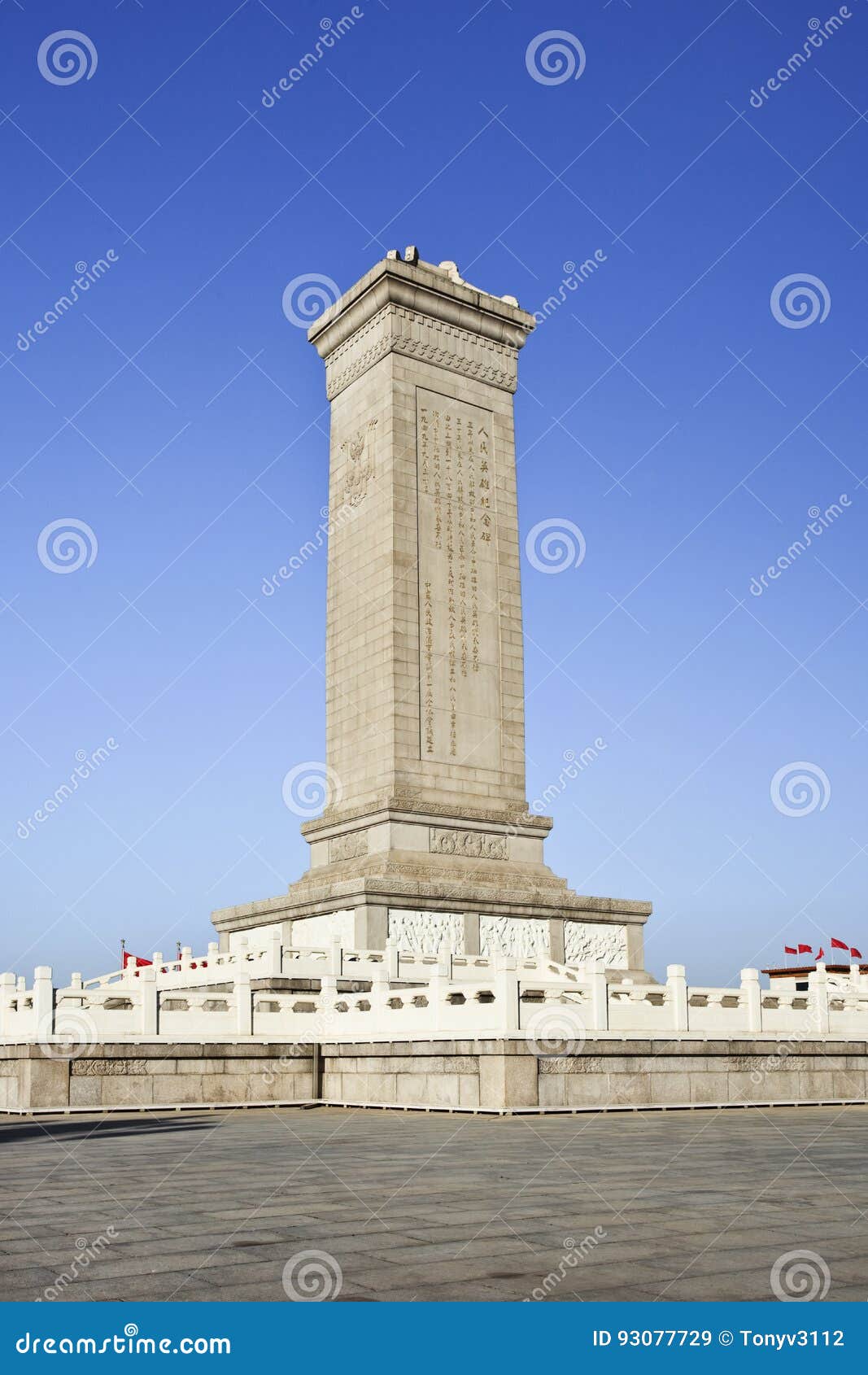 commemoration monument tiananmen square beijing against a blue sky