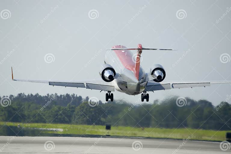 Commercial jet taking off stock image. Image of engine 810951