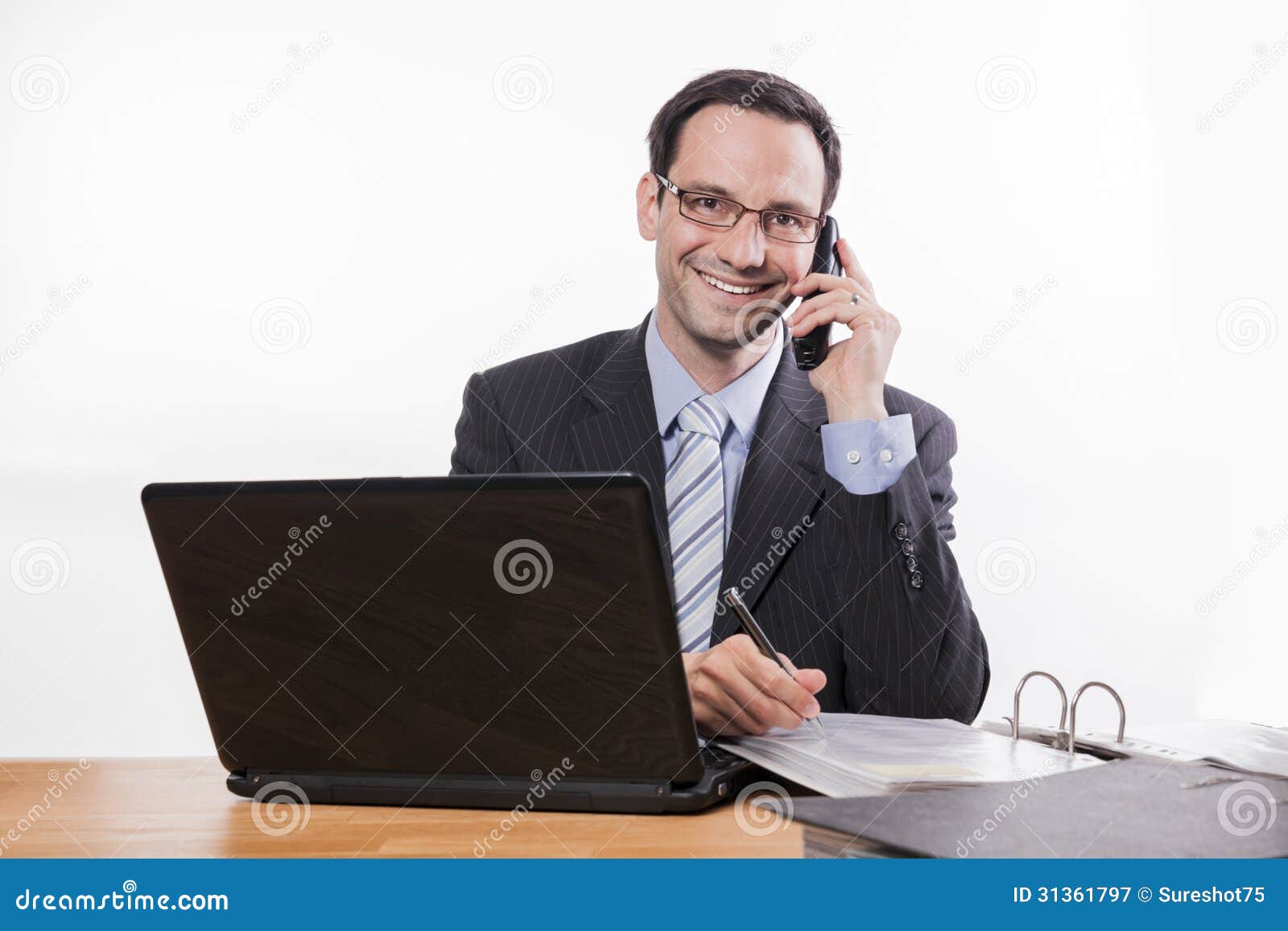 committed employee with glasses smiling at phone