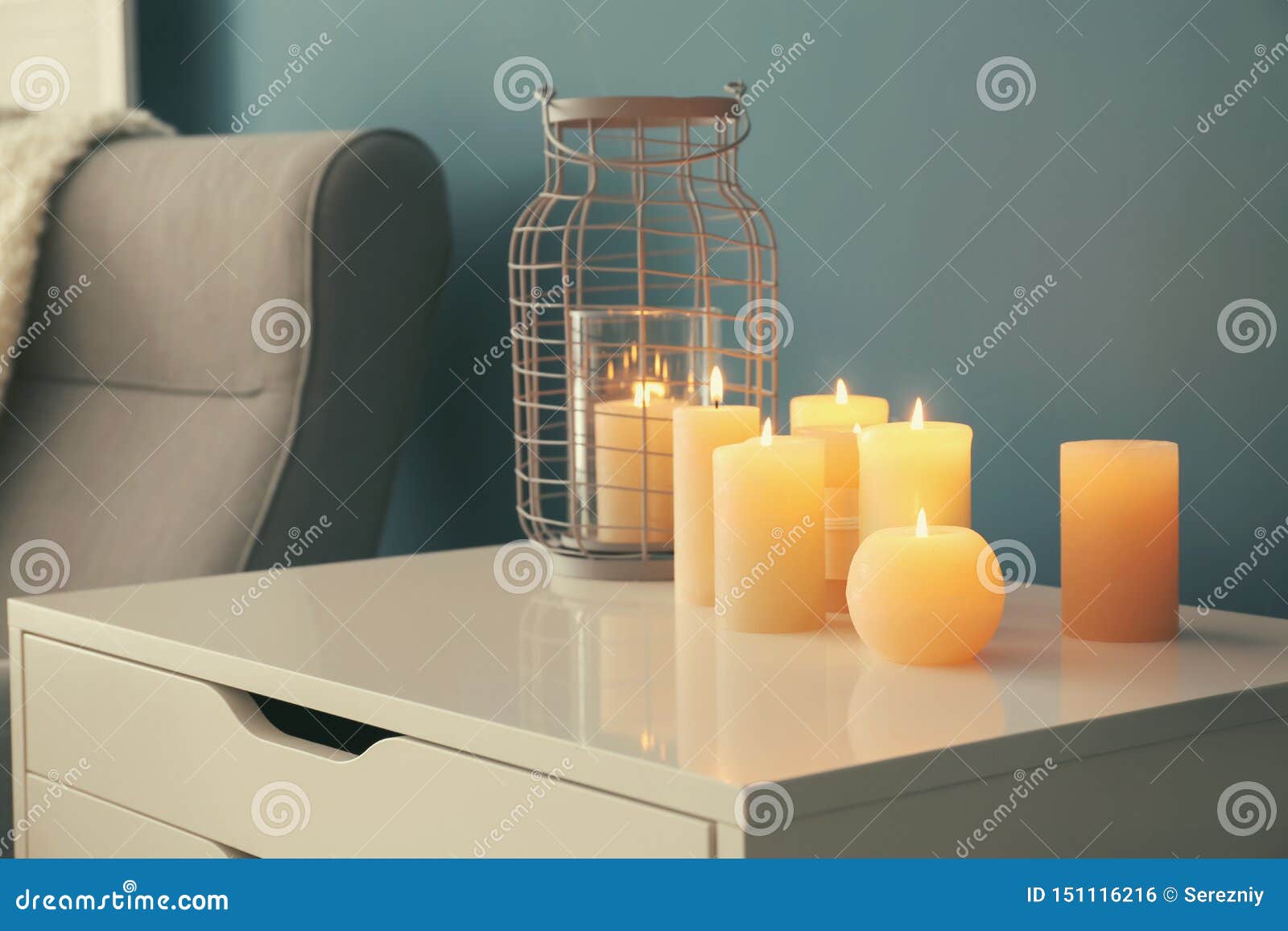 Commode with Burning Wax Candles in Living Room Stock Photo Image of