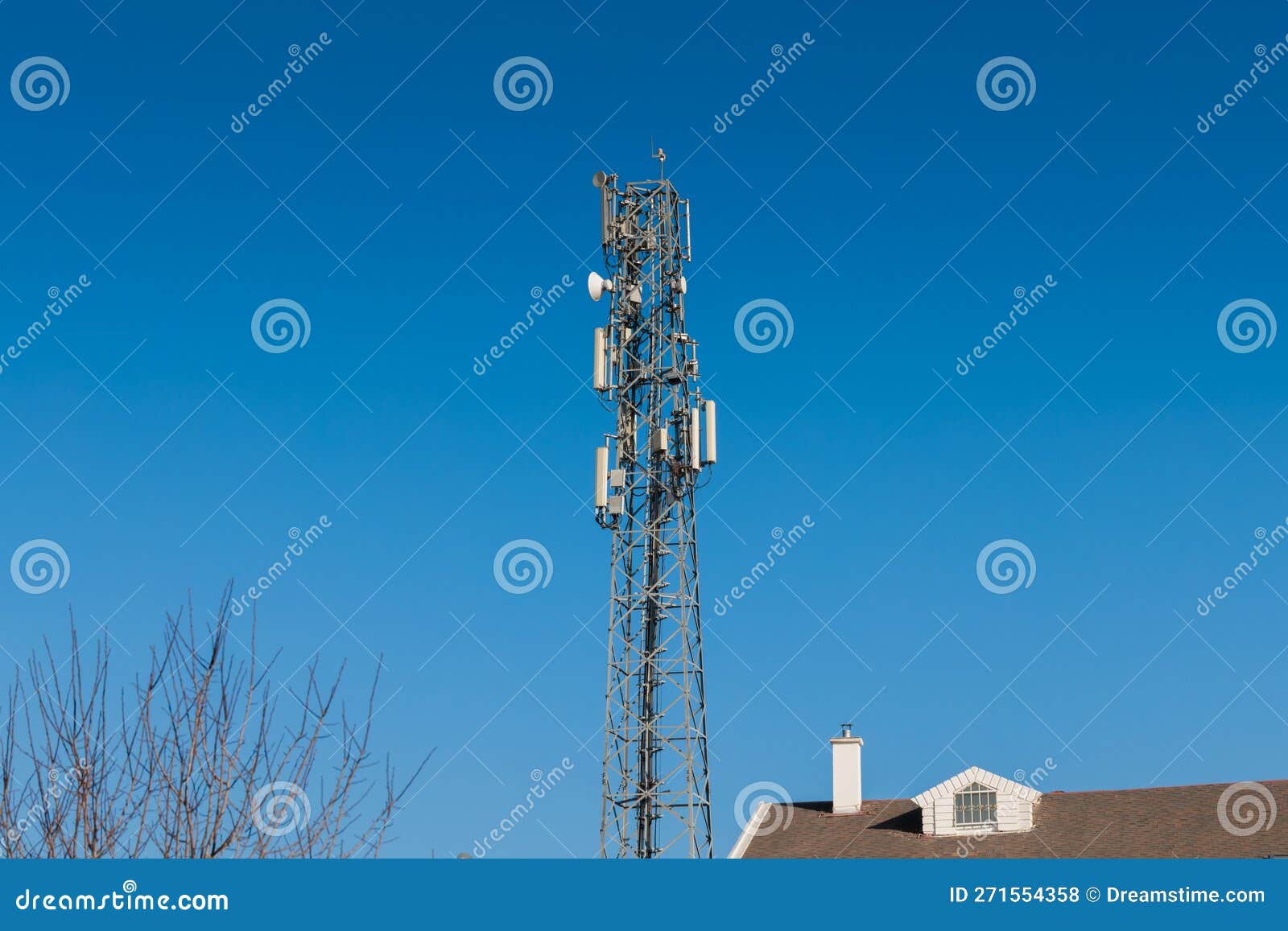 communication antenna transmitter. telecommunication tower. wireless 3g, 4g and 5g cell site in front of blue sky