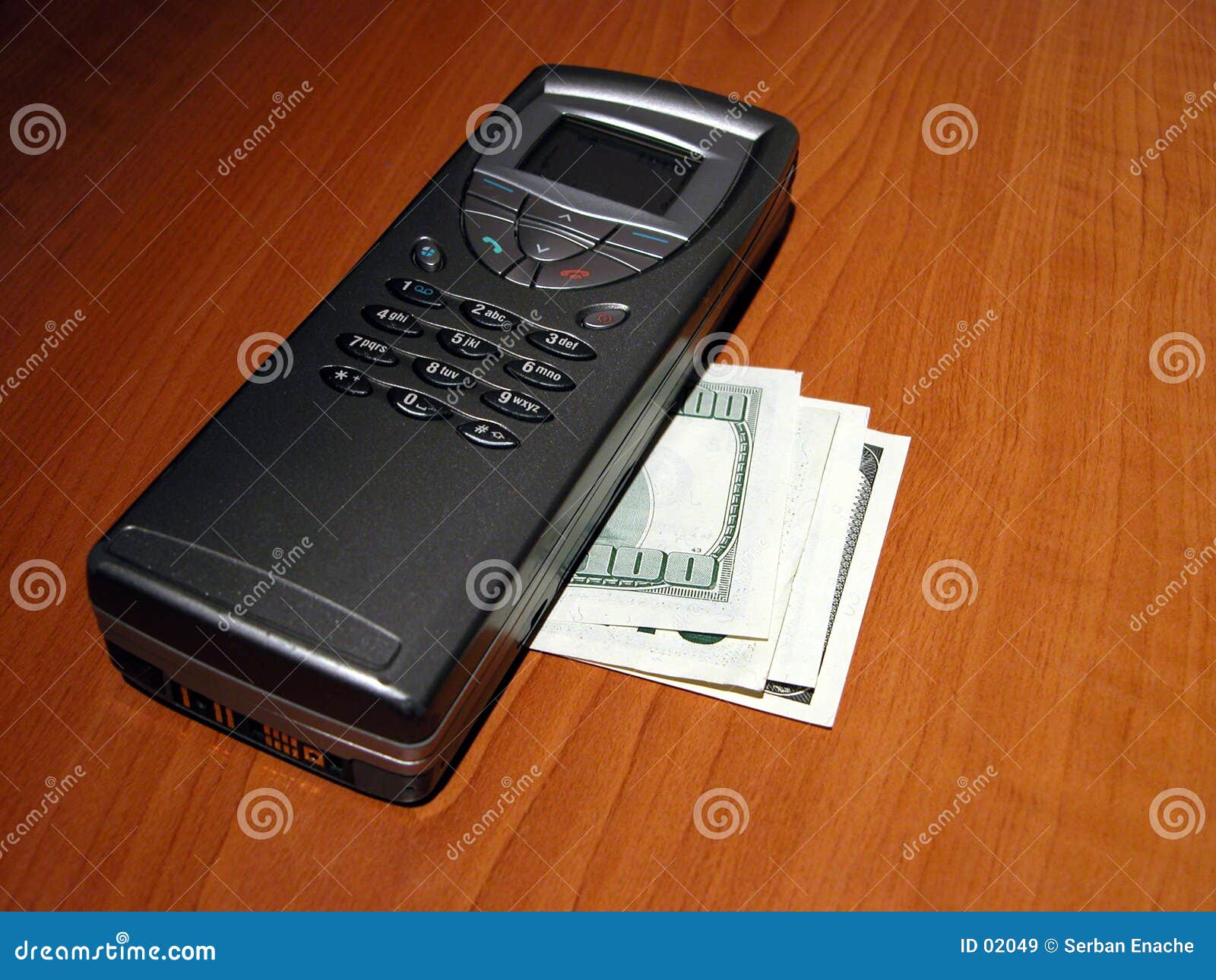 communicator and $100 bills