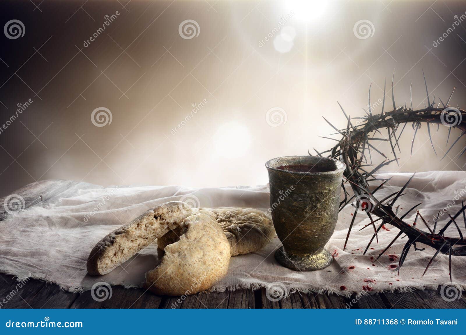 communion and passion - unleavened bread chalice of wine and crown