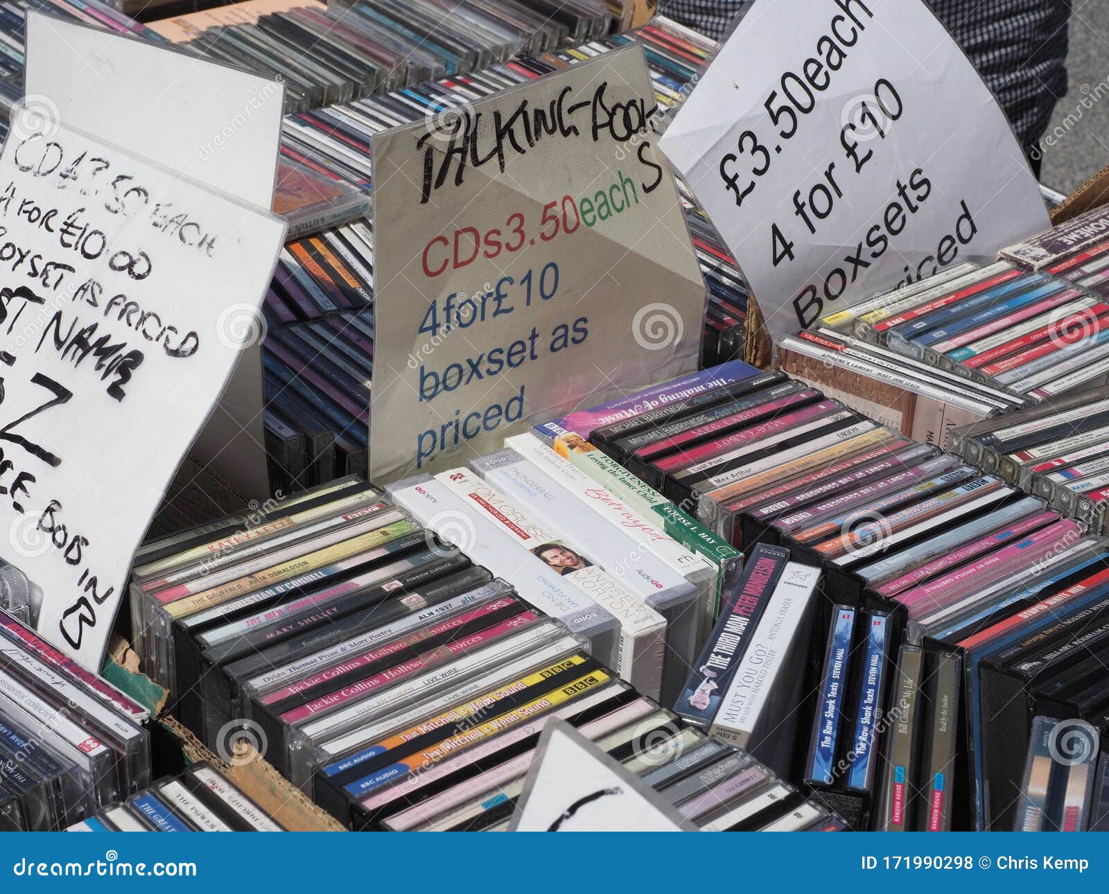 Close Up of a Stack of Various Compact Discs, Cds for Sale on a Stall