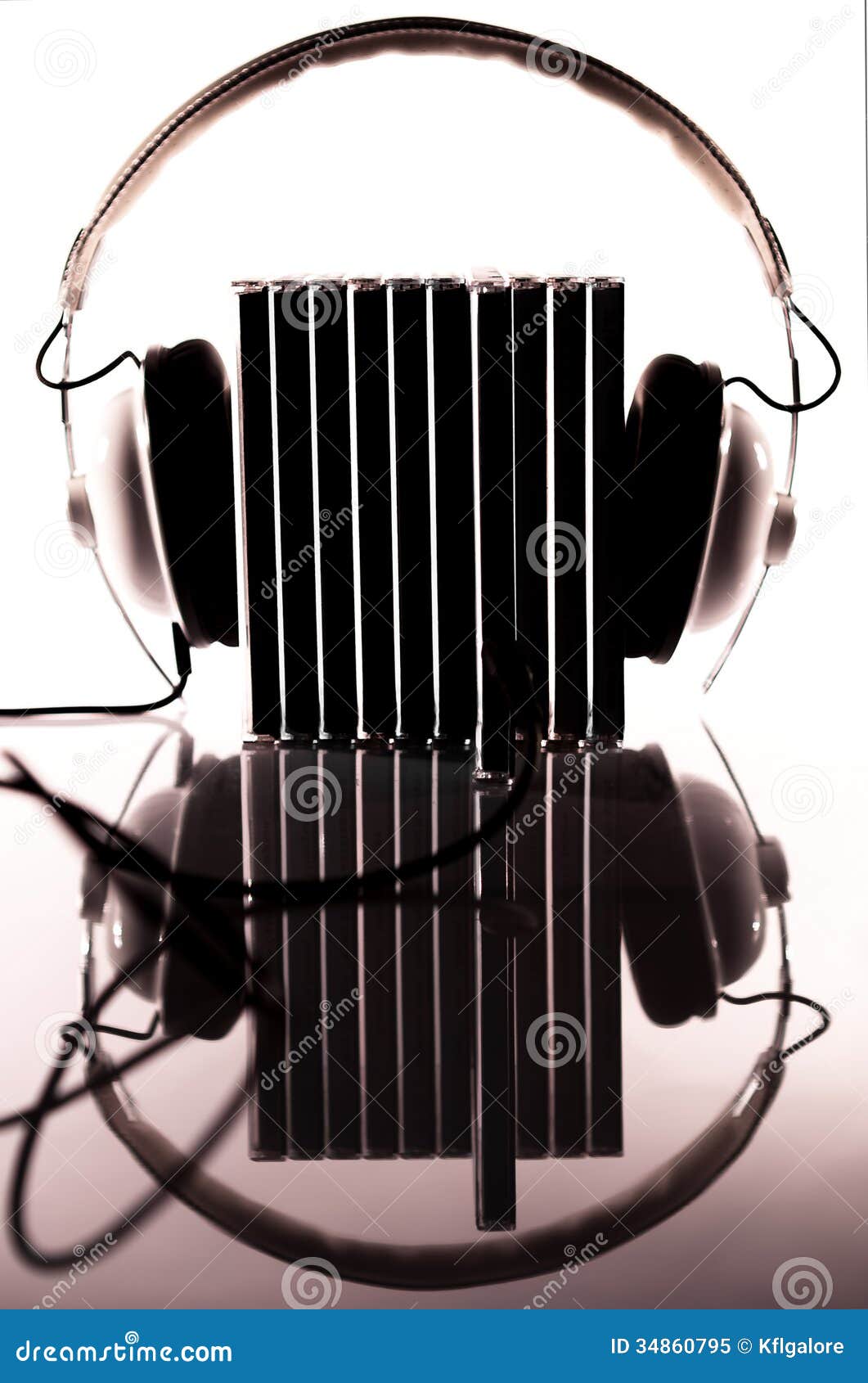 compact discs plugged-in into headphones