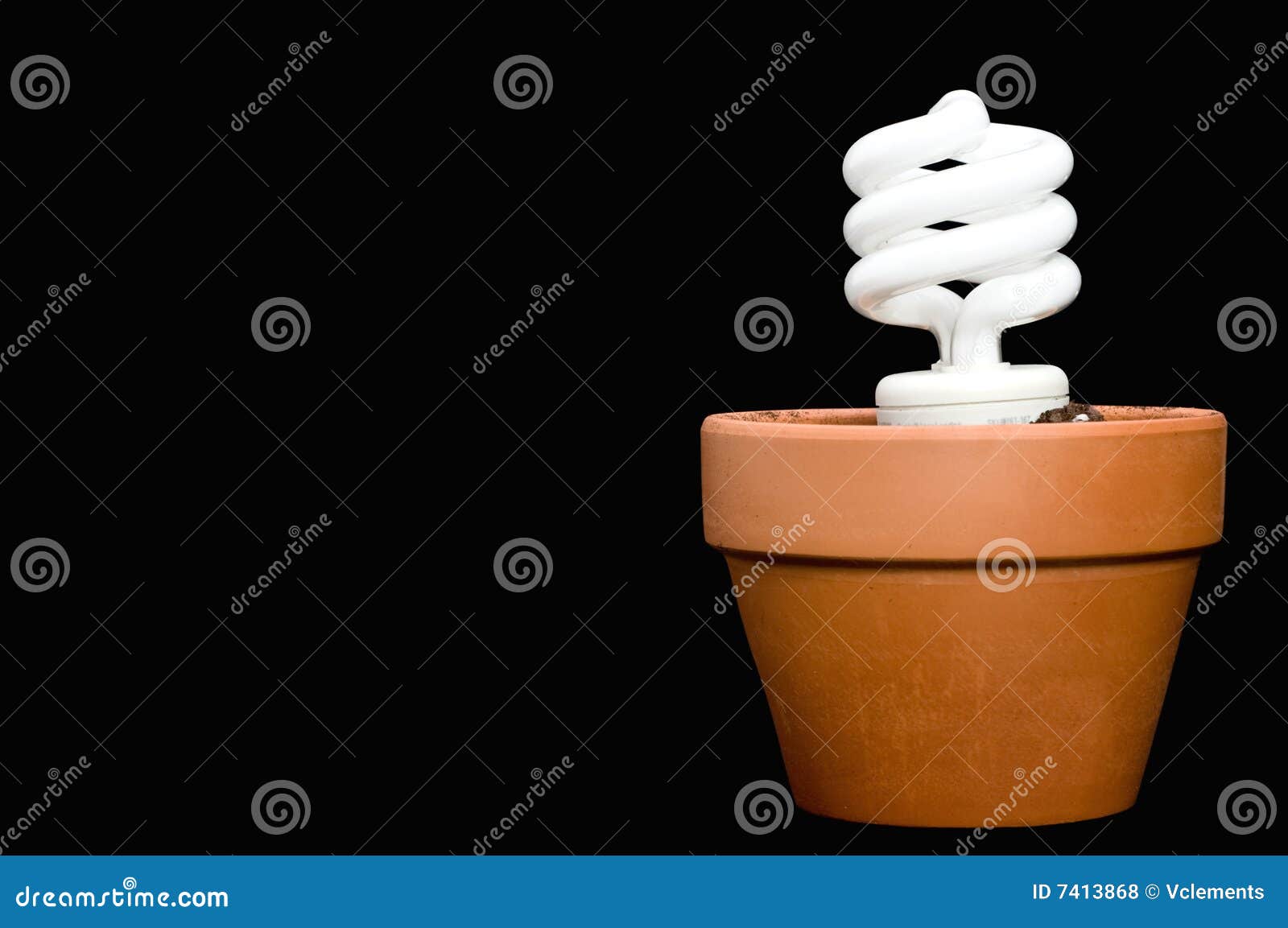 A Compact Fluorescent Bulb in a Planter Stock Photo Image of grow