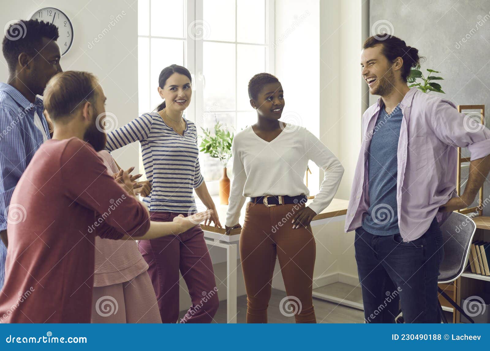 Company of Cheerful Young Multinational Friends Communicate by Telling Funny  Stories. Stock Photo - Image of bonding, meeting: 230490188