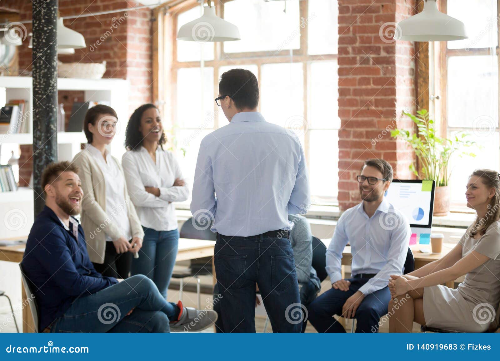 company executive manager talking with company members during briefing