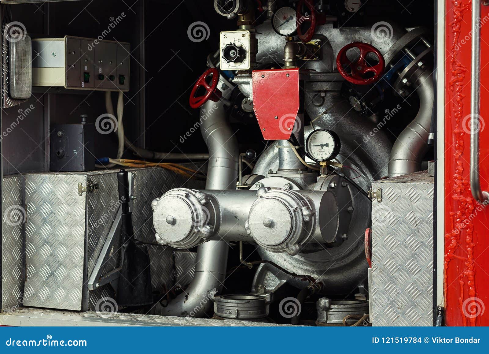 compartment of rolled up fire hoses on a fireengine. emergency s