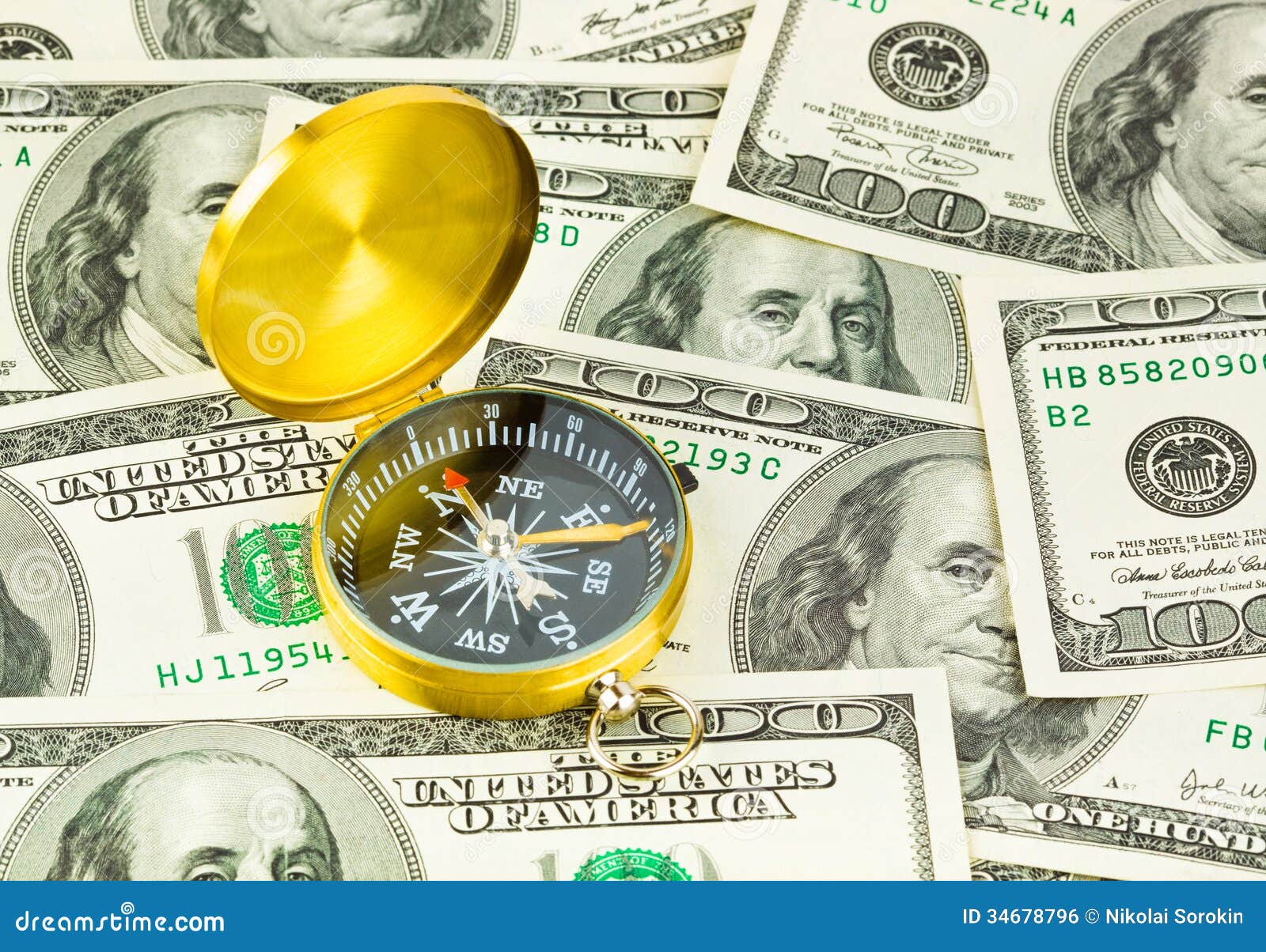 Compass and money stock photo. Image of direction, investment 34678796