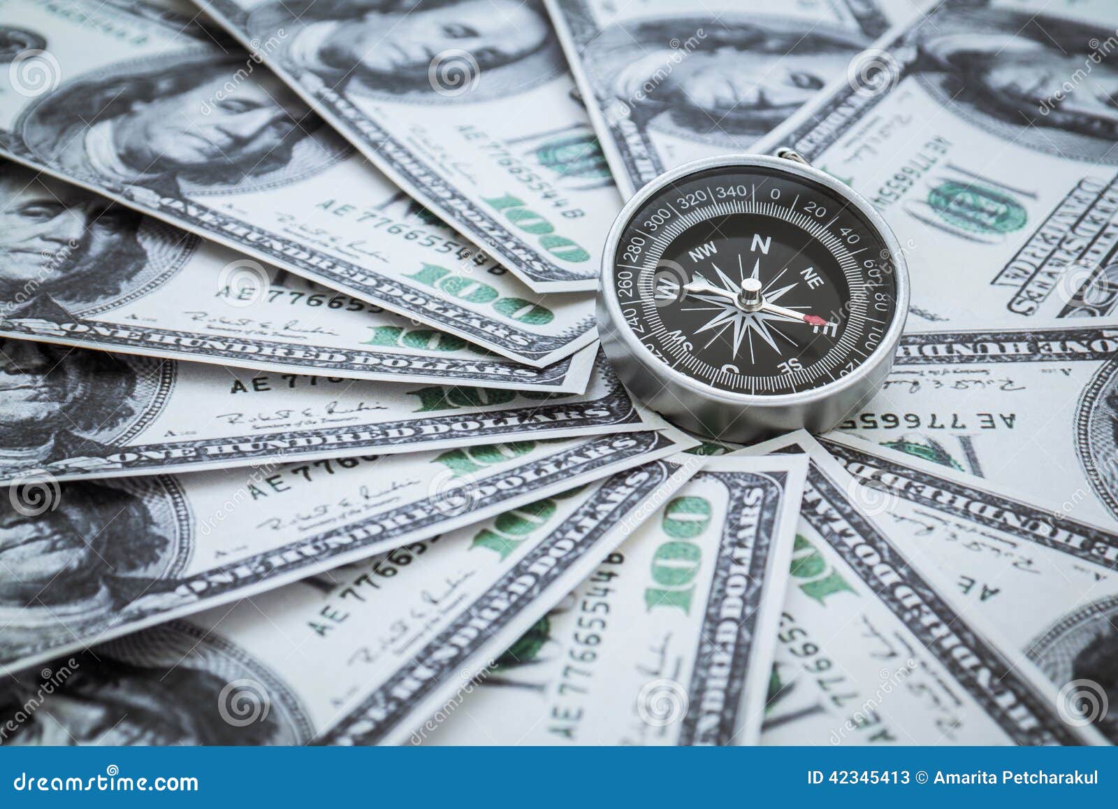 Compass and money stock image. Image of device, currency 42345413