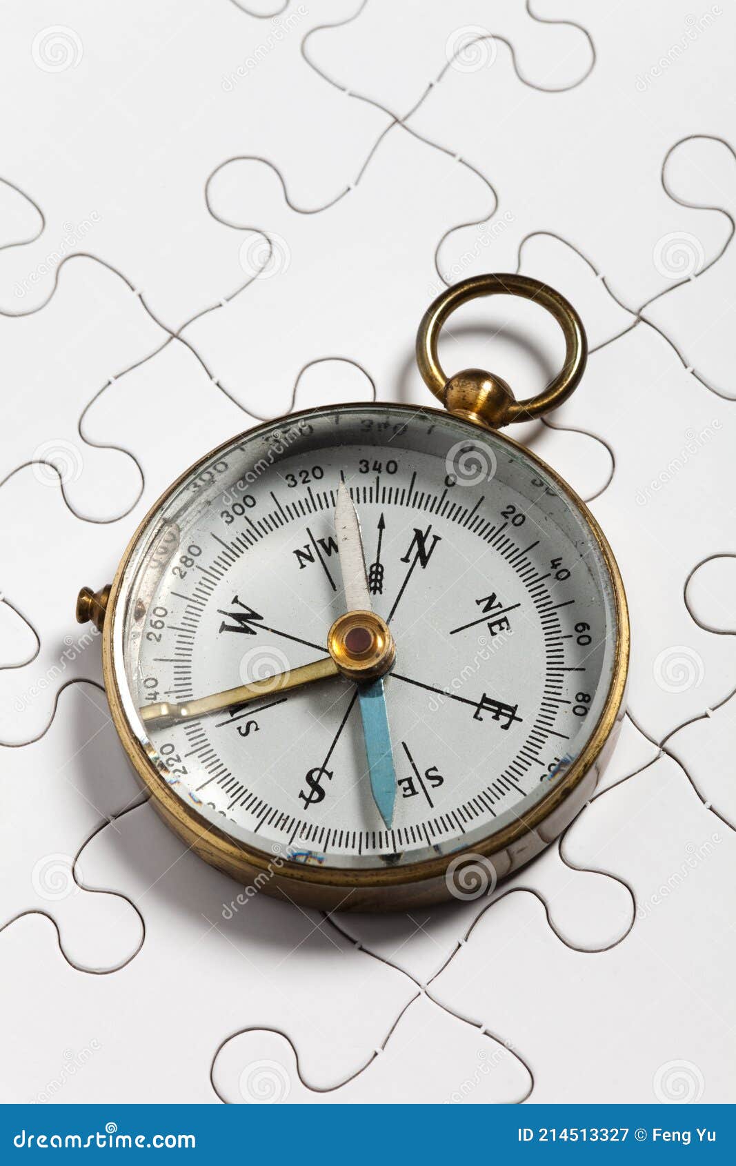 Compass and Puzzle stock image. Image of compass, backgrounds 214513327