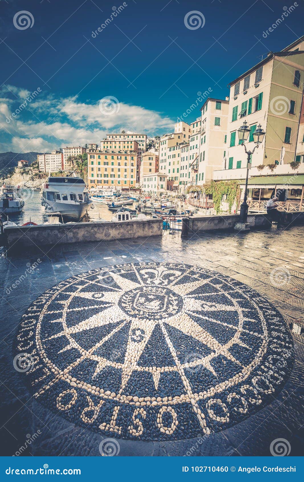 compass rose. windrose mosaic on the road in camogli, italian city