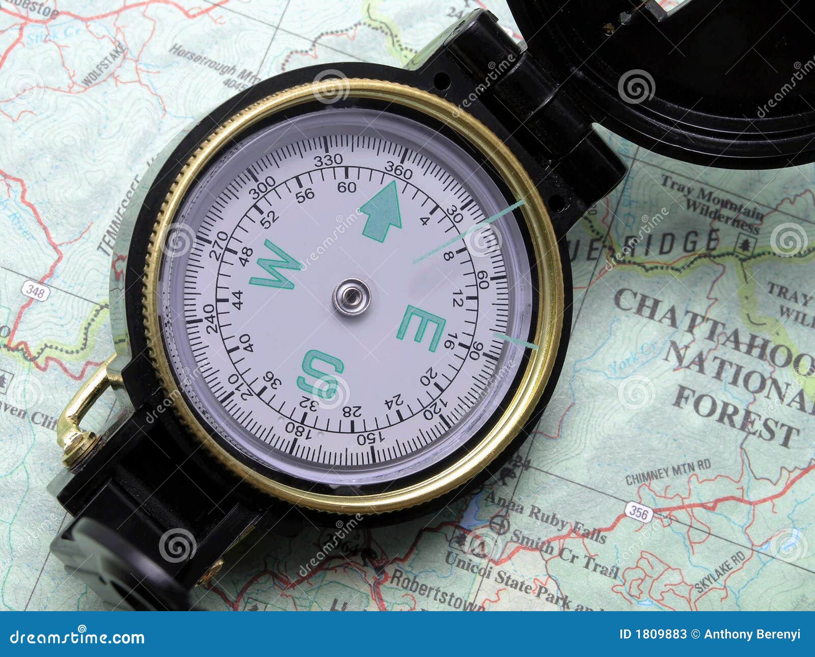 Compass on topo map 1 stock image. Image of orientation 1809883