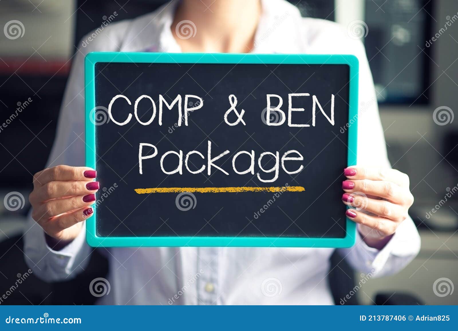 compensation and benefits at job concept with comp and ben text written on cardboard hold by employee