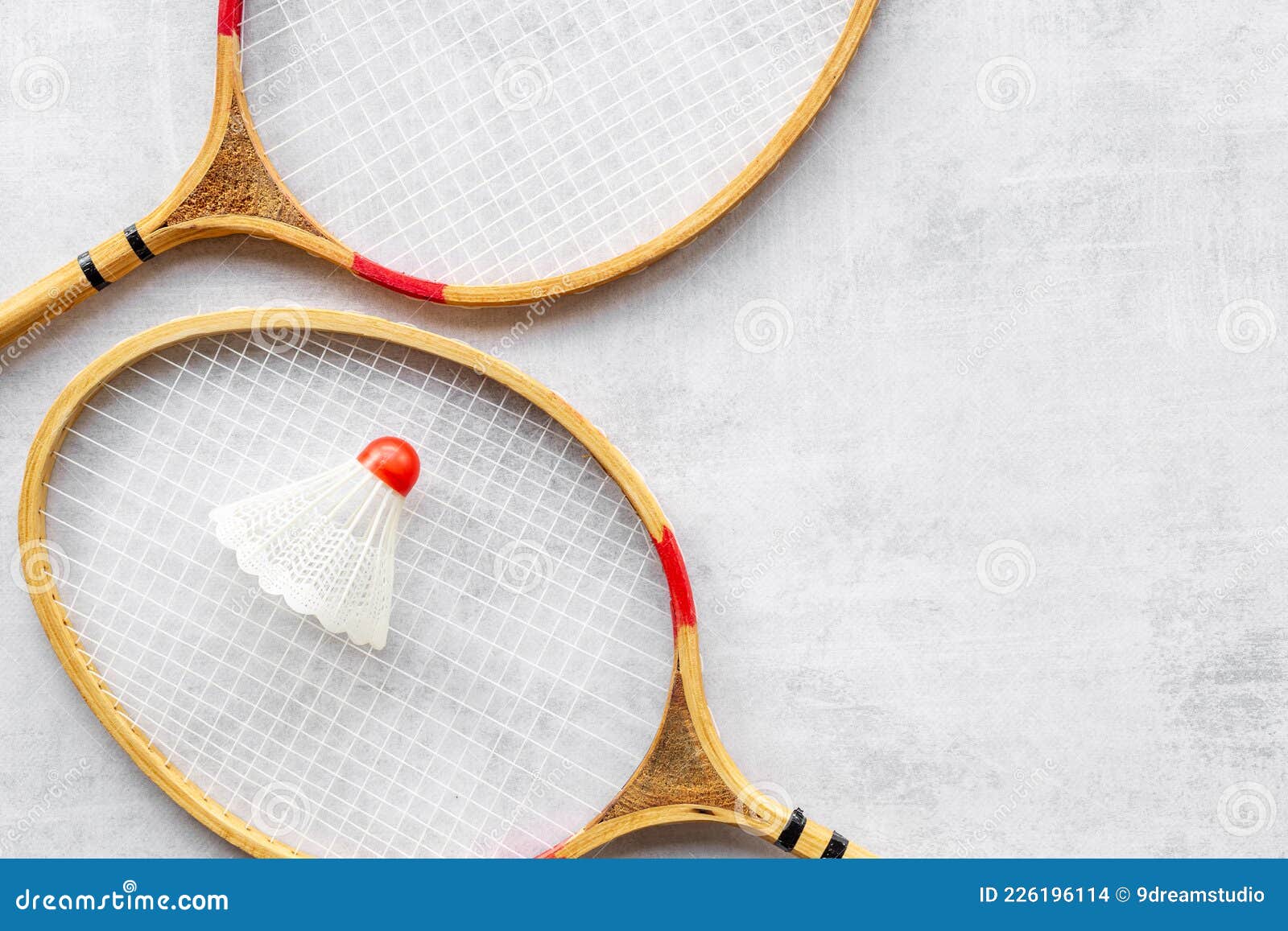 Competitive Sports Concept with Badminton Rackets and Shuttlecock Stock