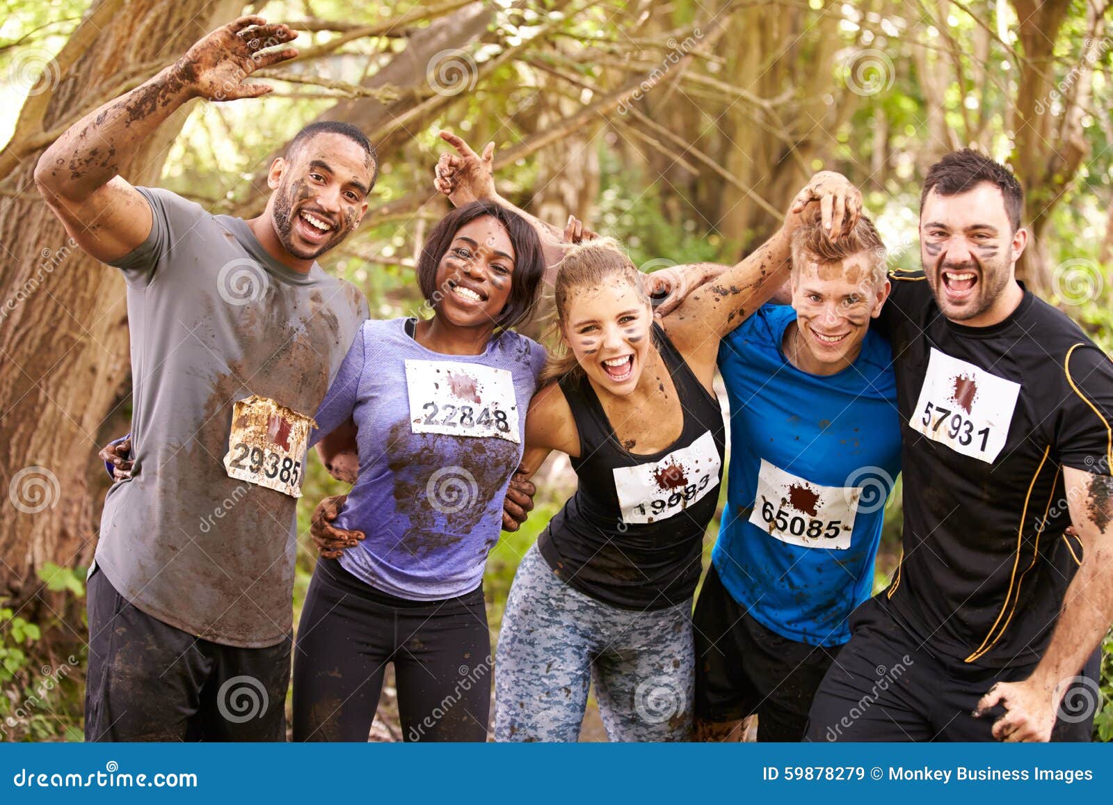 competitors celebrate completing an endurance sports event