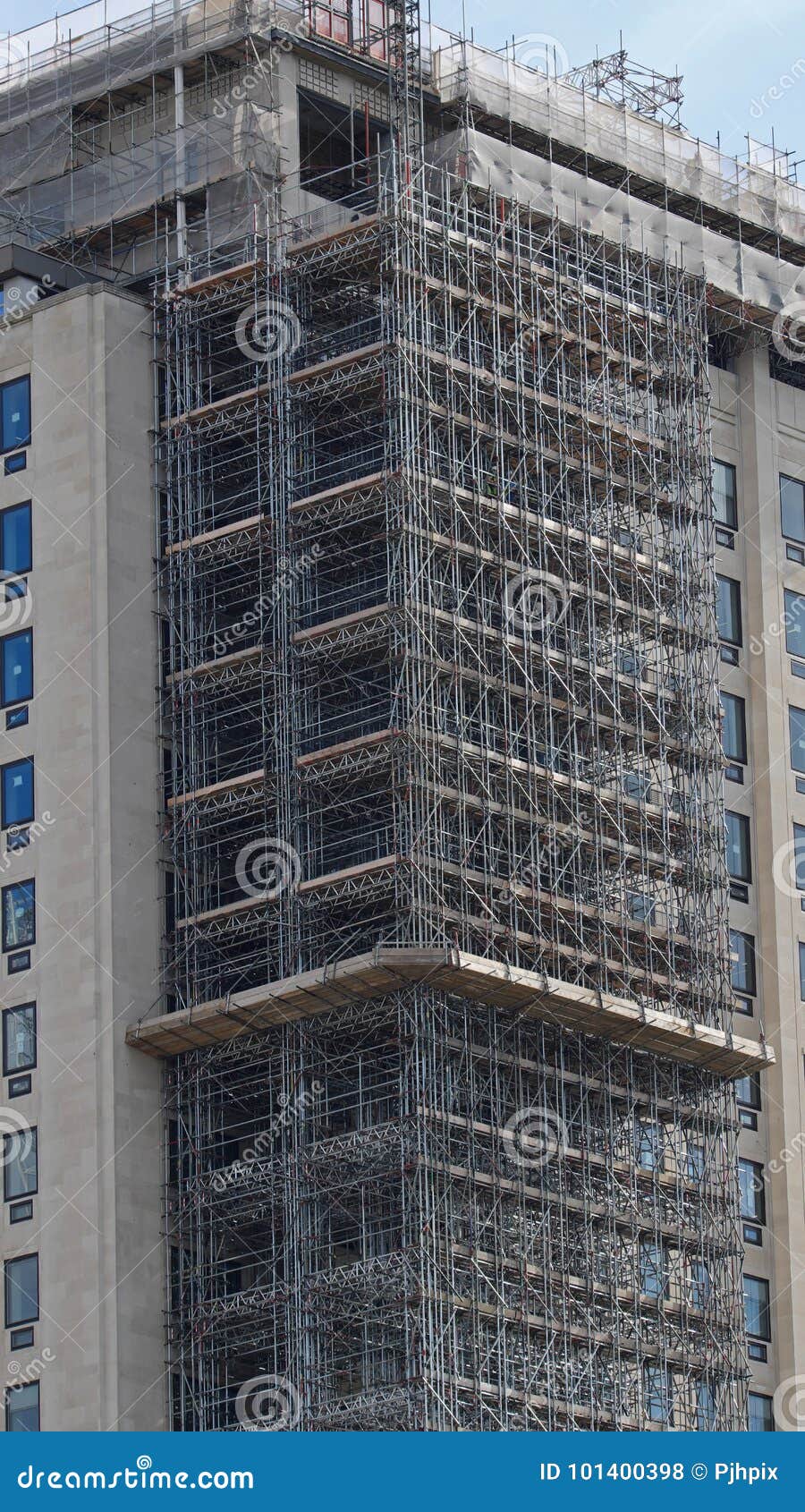 Dense scaffolding tower UK stock photo. Image of pipe 101400398