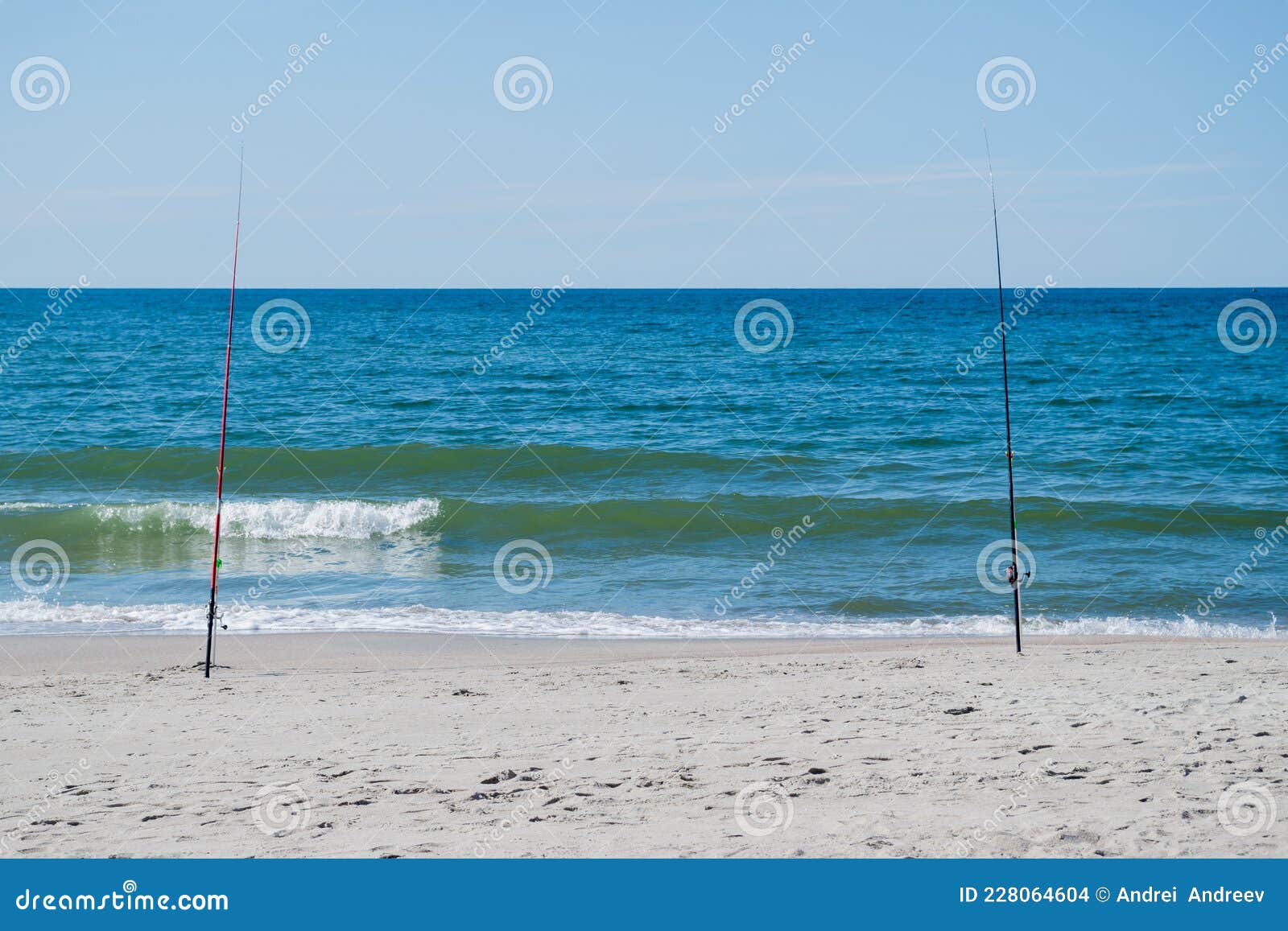 Composite Fishing Rods on Fork Stands on Sandy Beach of Azure Sea for  Catching Flounder from Shore on Background of Sea Horizon Stock Photo -  Image of ocean, azure: 228064604